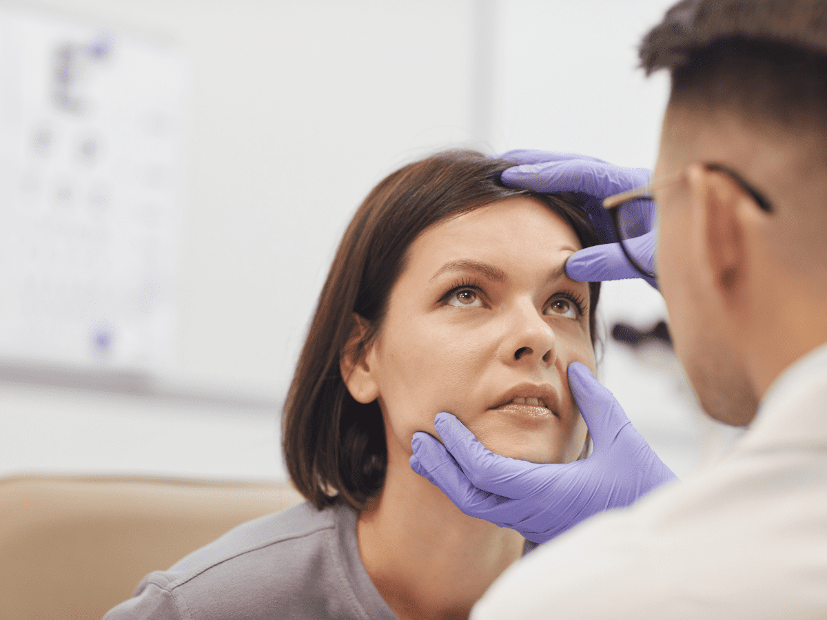 Doctor looking in patients eye